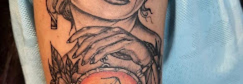 The Joker Tattoo Studio